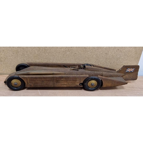 185a - Kingsbury Golden Arrow clockwork tinplate landspeed record car with Uk flags to tail