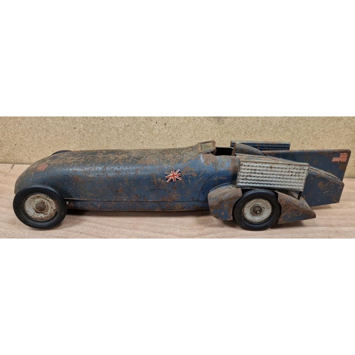 185 - Kingsbury Bluebird clockwork tinplate landspeed record car with UK and USA flags to tail, Dunlop rub... 