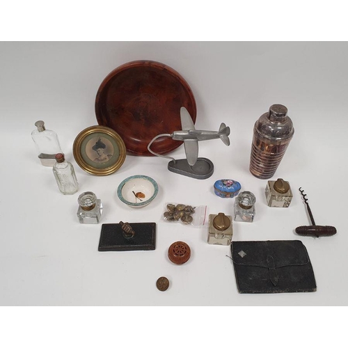 228 - Quantity inkwells, military brass buttons, corkscrew, silver-plated cocktail shaker, aeroplane desk ... 