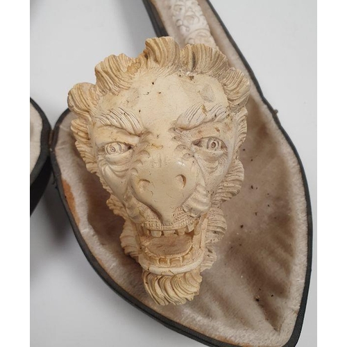 233 - Carved meerschaum giant pipe the bowl carved with lions head, stylised floral carving to the handle,... 