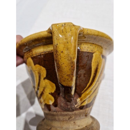 28 - 19th century Staffordshire pottery slipware conical bowl, decorated in cream slip with band of folia... 