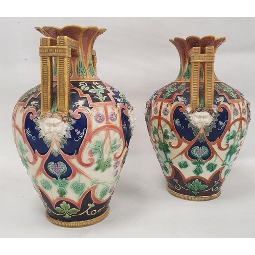 29 - Pair of Copeland majolica two-handled oviform vases, late 19th century, impressed marks, with pierce... 