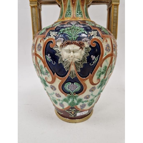 29 - Pair of Copeland majolica two-handled oviform vases, late 19th century, impressed marks, with pierce... 