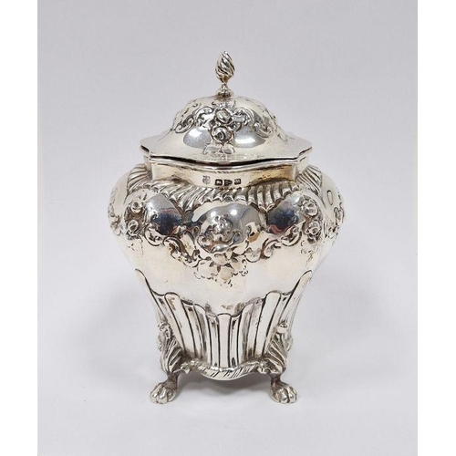 368A - Victorian silver tea caddy with domed top, shouldered and tapering with floral repousse, four paw fe... 