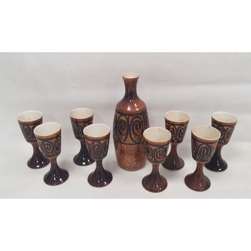 37 - Iden Pottery (Rye, Sussex) water/wine set with jug and eight goblets, each decorated with a band of ... 