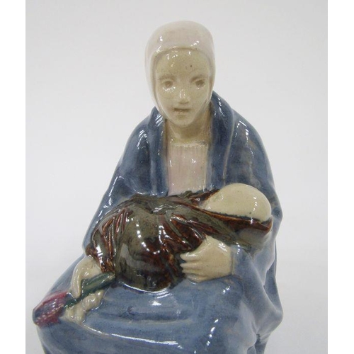 41 - Carter Stabler Adams Poole pottery lavender figure by Phoebe Stabler, the seated woman wearing heads... 