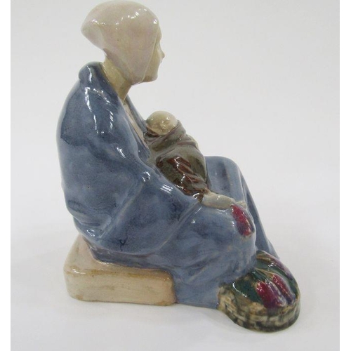 41 - Carter Stabler Adams Poole pottery lavender figure by Phoebe Stabler, the seated woman wearing heads... 