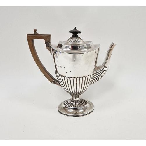 432 - Victorian silver coffee pot, with half gardrooned decoration, raised on a pedestal base, with wooden... 