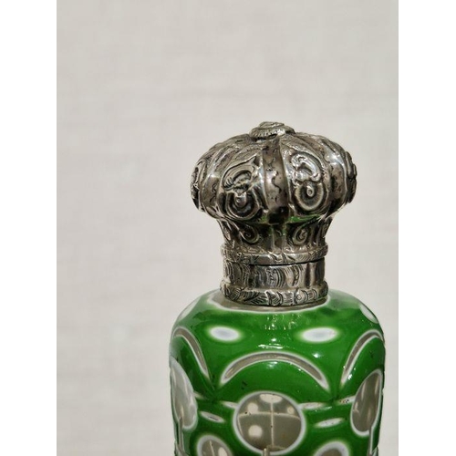 440 - Victorian green cased engraved glass scent bottle, with embossed white metal mount and original glas... 