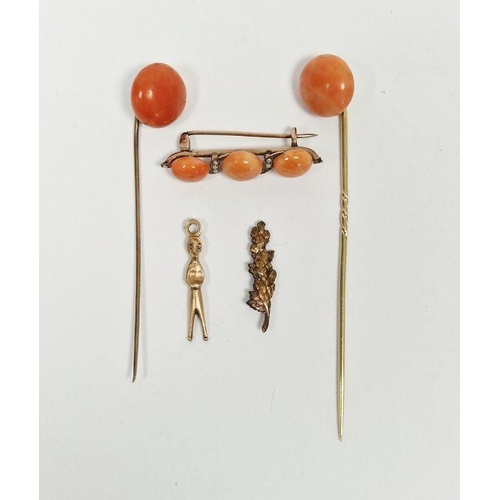 506 - Gold coloured, coral and seedpearl bar brooch, two gold-coloured metal and coral stickpins, an oakle... 