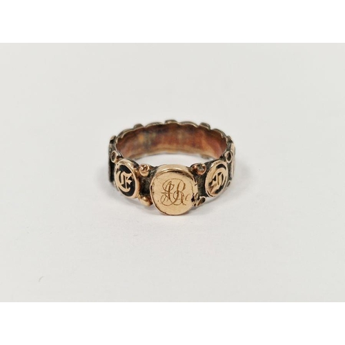 510 - Victorian gold-coloured metal and enamel mourning ring having oval medallions with italic letters