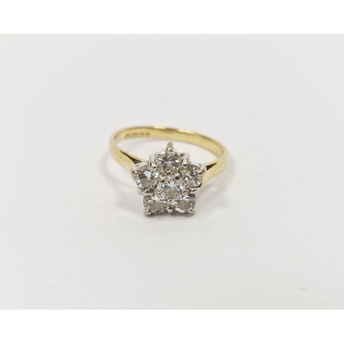 547 - 18ct gold and diamond cluster ring, daisy-pattern