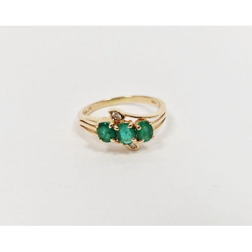 548 - 14ct gold, emerald and diamond dress ring set three oval emeralds and two small diamonds