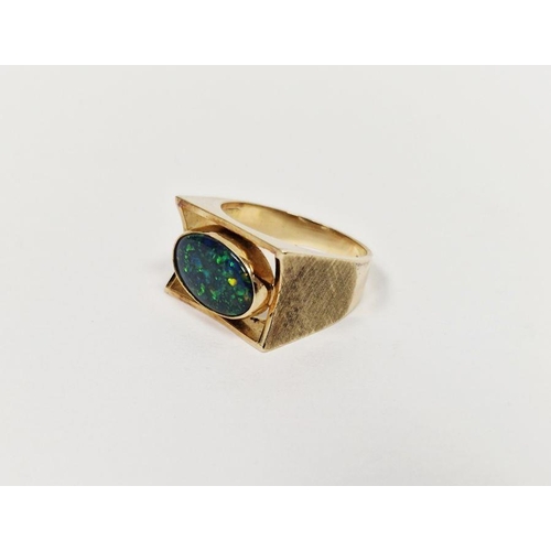 570 - 14ct gold and single opal ring set oval polished doublet stone in rectangular open surround, 6.4g