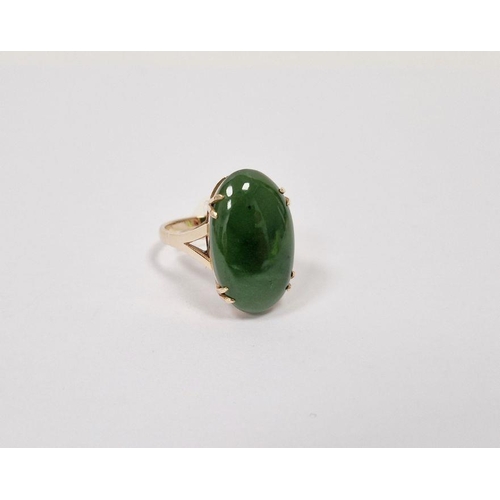 577 - Gold-coloured and polished green hardstone ring set single stone