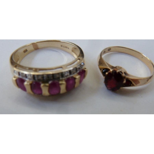 604 - 9ct gold, pink stone and diamond dress ring set five pink stones with two rows of small diamonds and... 