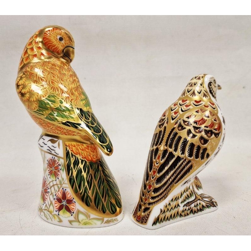 65 - Two Royal Crown Derby bone china bird paperweights, comprising: a 'Sun Parakeet', printed and cancel... 