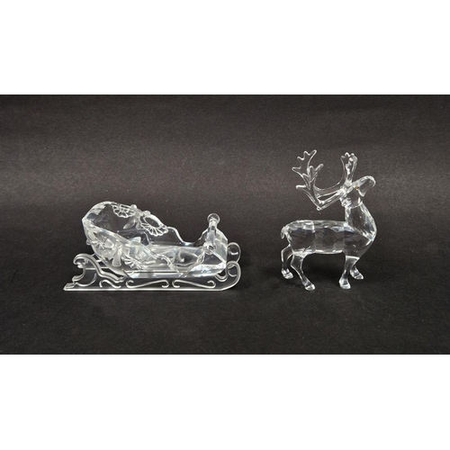 77 - Two Swarovski crystal models from the Exquisite Accents series, comprising Sleigh 1996 (205165) with... 