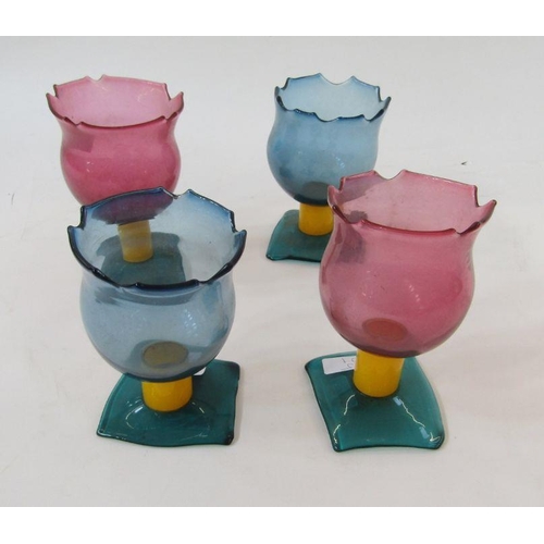 97 - Four 1990s coloured studio glass goblets and a tapering conical decanter, the goblets with pink and ... 