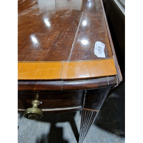 1097 - George III mahogany and satinwood banded oval fall-flap pembroke table, fitted one real and one dumm... 