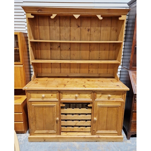 1065 - Antique pine kitchen dresser, the top section comprising two fitted shelves raised over three short ... 