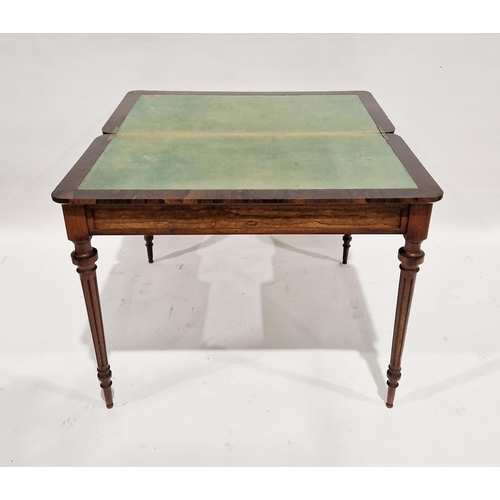 1115 - Early 19th century rosewood folding card table, opening to reveal a green baize top, raised on turne... 