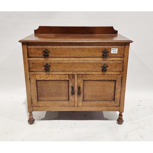 1156 - Early 20th century oak dressing table chest with fitted bevelled edged swing mirror, the chest itsel... 