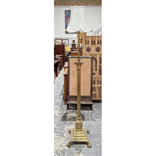 1175 - Victorian brass Corinthian column standard lamp, the adjustable column above fluted lower part and w... 