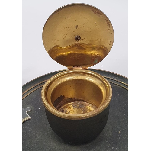 148 - Black and brass inkstand, circular with hinged cover and a Danish pewter small oil lamp in the form ... 