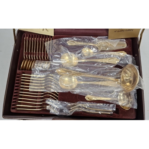 203 - Set of German gold-plated table flatware for 12 persons, Bestecke, with ornate handles, in case