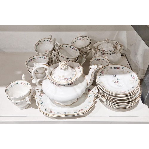 32 - English porcelain part tea service, circa 1835, painted with sprigs of flowers and leafy tendrils wi... 