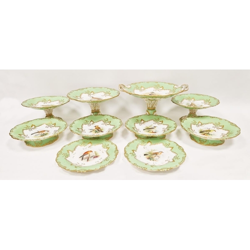 38 - 19th century English porcelain ornithological green ground dessert service, each painted with a spec... 