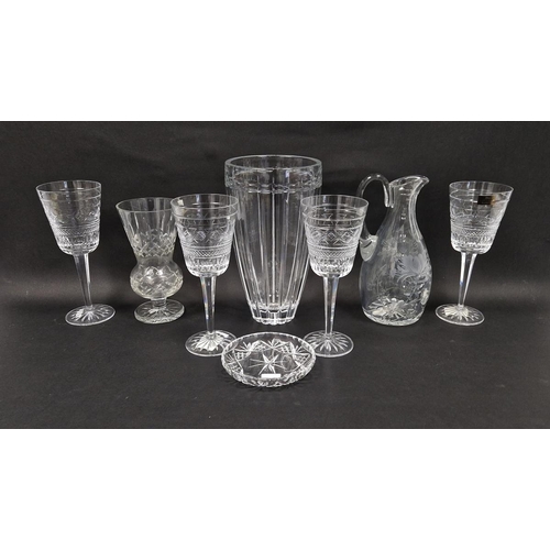 56 - Four Waterford Michael Aram designed Ma Gipur goblets, one with Aram label, a tapering oviform cut g... 