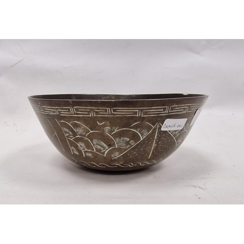 94 - 20th century Chinese bronze bowl, decorated with dogs of fo and a wave-pattern, within key and wave-... 