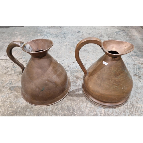 169 - Group of metalware including: copper measuring pitchers in sizes (one gallon to one pint), a brass m... 