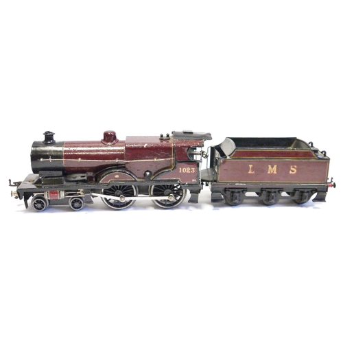 401 - Bassett Lowke O gauge 4-4-0 clockwork locomotive No.1023 maroon livery with six wheel LMS tender (ap... 