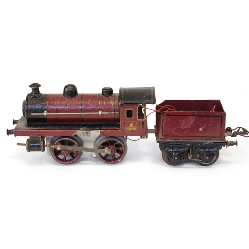 427 - Märklin O gauge 0-4-0 locomotive No. R 11970 with four wheel tender in red and black lined livery (p... 