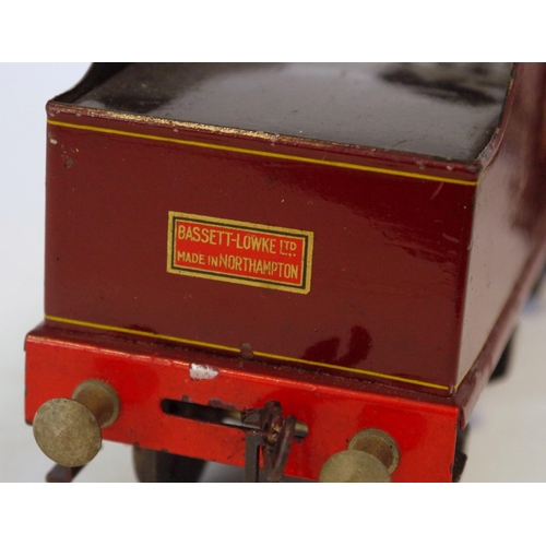 428 - Bassett-Lowke O gauge 2-6-0 live steam locomotive no.13000 with six wheel LMS tender in maroon liver... 