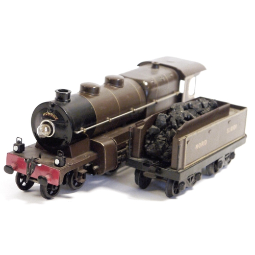 443 - Hornby 0 gauge clockwork 4-4-2 locomotive marked 318101 to cab, with  eight wheel Nord 31801 tender ... 