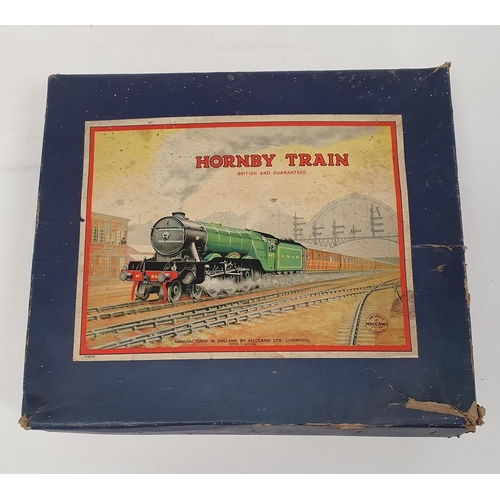 509 - Hornby 0 gauge boxed train set containing a LMS 2270 0-4-0 clockwork locomotive, three LMS 12530 rol... 