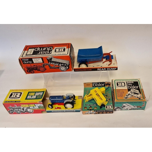 526 - Three boxed Britains farming diecast models to include Ford Super major 5000 diesel tractor (damaged... 