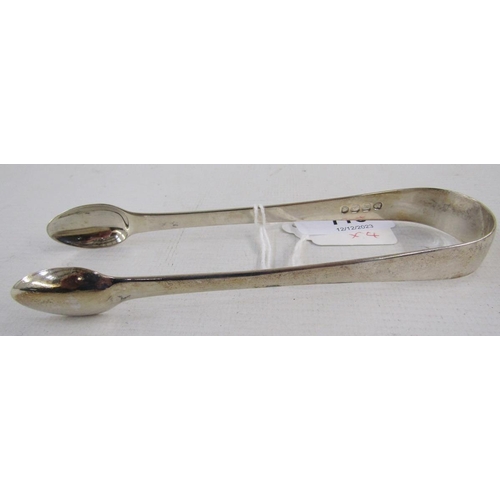 113 - Three silver sugar tongs, comprising: a George III example of plain form, hallmarked London, 1782, m... 