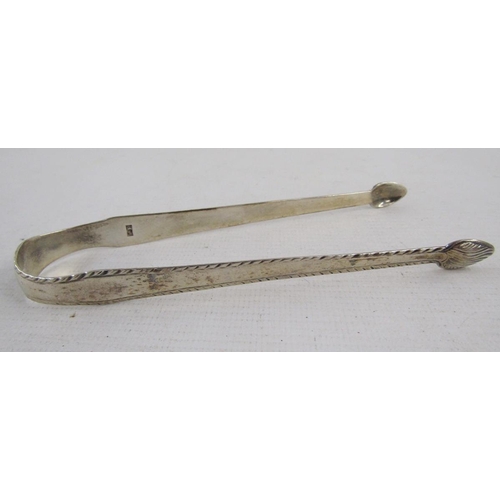 113 - Three silver sugar tongs, comprising: a George III example of plain form, hallmarked London, 1782, m... 