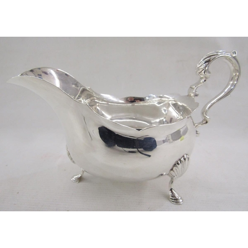 119A - Edward VII Georgian-style silver sauceboat, with acanthus scroll handle, shell cast terminals and pa... 