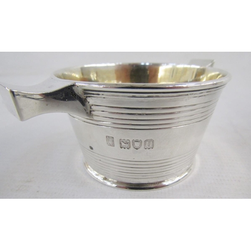 122 - George V Silver engraved armorial mustard pot and two salt cellars, each of cylindrical form with re... 