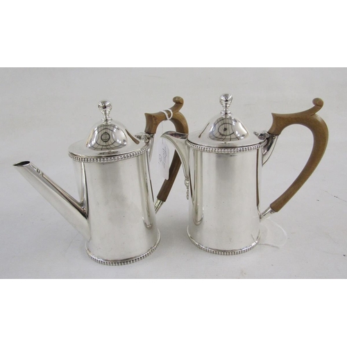 129 - George V silver teapot and a hot-water jug and cover, the hot-water jug hallmarked London, 1911 and ... 