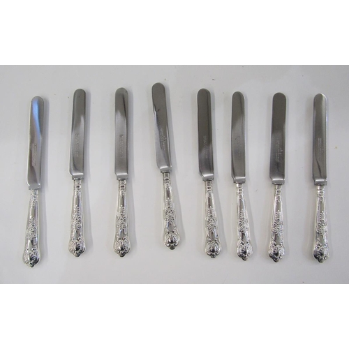 137 - Set of eight silver-handled table knives, queens pattern, marks rubbed, the blades stamped 'Harrison... 