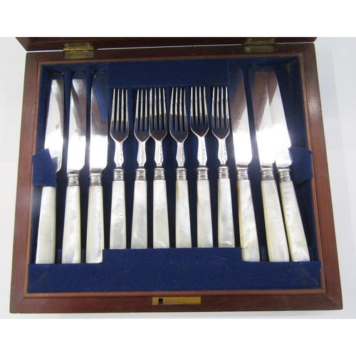 157B - Set of 12 mother of pearl handled dessert knives and forks in mahogany canteen, a plated muffin dish... 