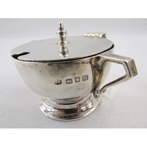 19 - George V Art Deco silver condiment set, comprising lidded mustard, open salt and pepper pot, with on... 