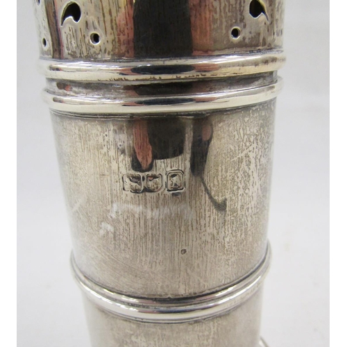 24 - Edwardian silver sugar caster, the domed top with finial, cylindrical body, 16cm high (with slight d... 